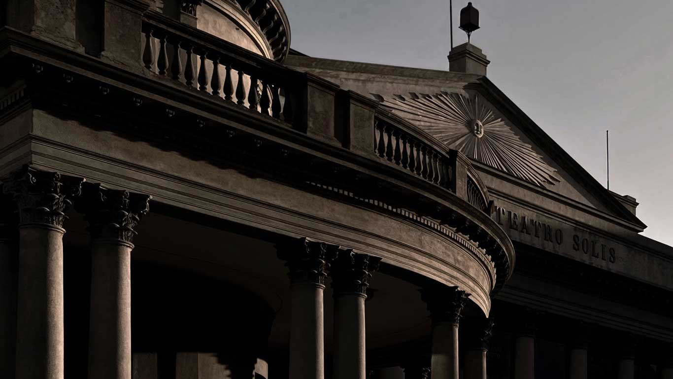 La imagen muestra la majestuosa fachada del Teatro Solís, destacando sus columnas corintias y la elegante balconada en un entorno de luces y sombras. Una visita al teatro es una de las mejores cosas que hacer en Montevideo.